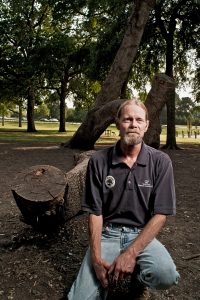 Steven Houser stood with members of the Dallas Historic Tree Coalition beside a suspected Indian Tree Marker in Harry Moss Park in Dallas, Texas on June 4, 2012. Indian Tree Markers were once young trees strapped at a slant by native peoples. The bound trees would eventually grow sideways and direct knowing travelers to shelter, water and other geographic points of interest. Dallas Historic Tree Coalition Members photographed: Steve Houser (in blue polo shirt) Sara Beckelman (in floral shirt) Kirbie Houser (in white shirt) Jim Bagley (in forest green shirt) Jim Folger (in brigh green shirt)